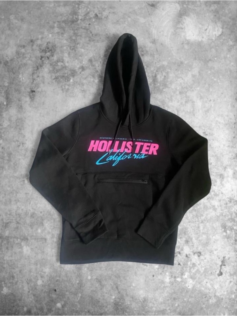 Hollister Black Hoodie with Pink and Blue Text